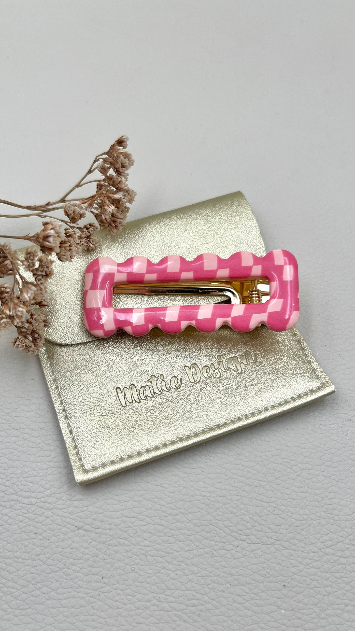 Pince à cheveux damier