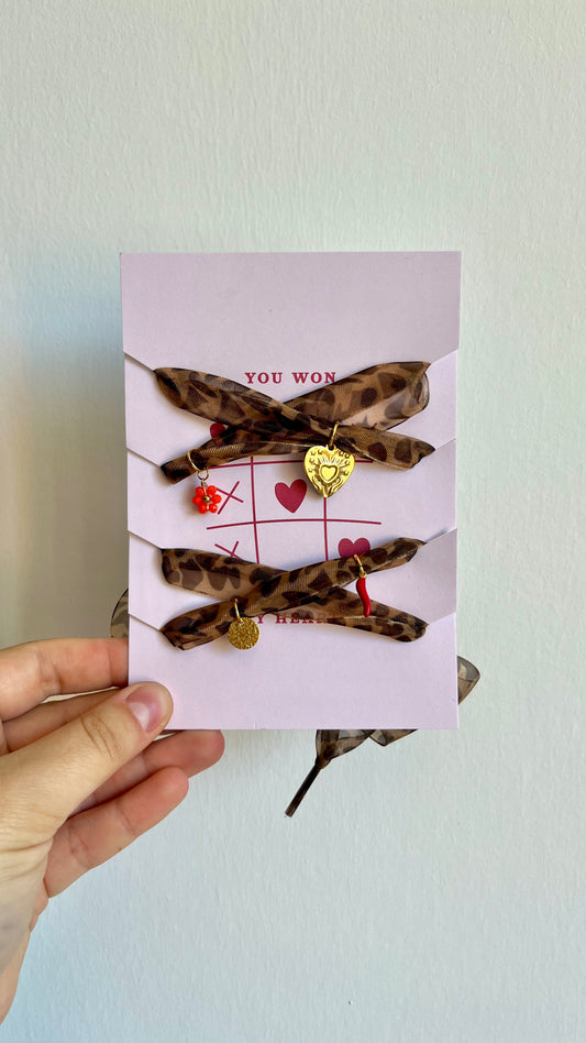 Lacets léopard à charms