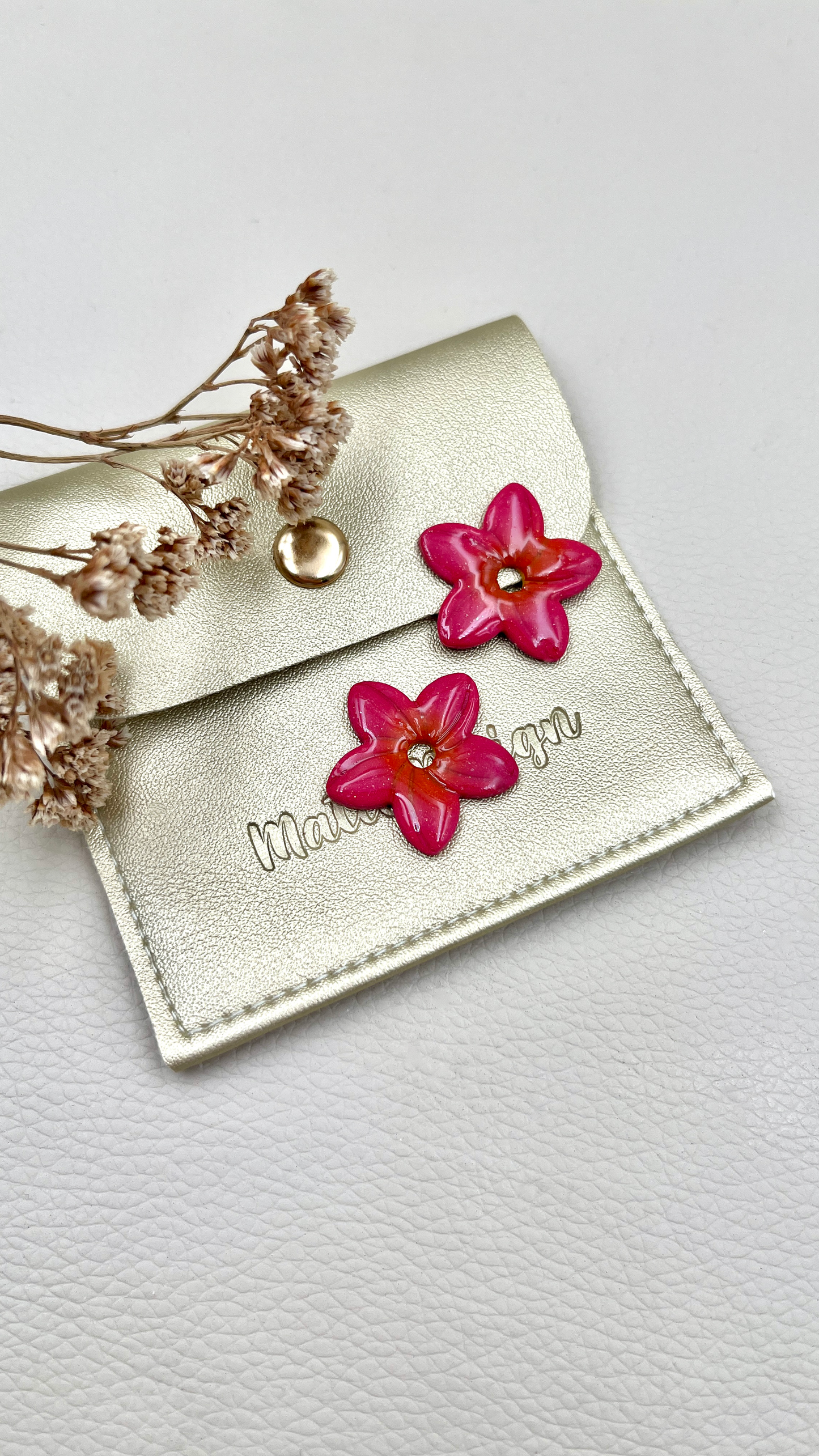 Pampilles Monoï fushia