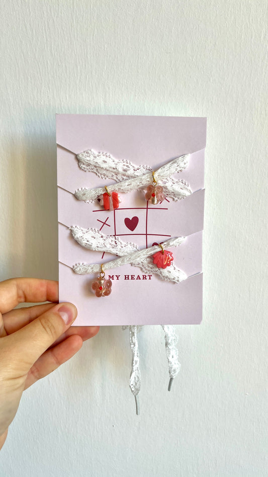 Lacets dentelle à charms