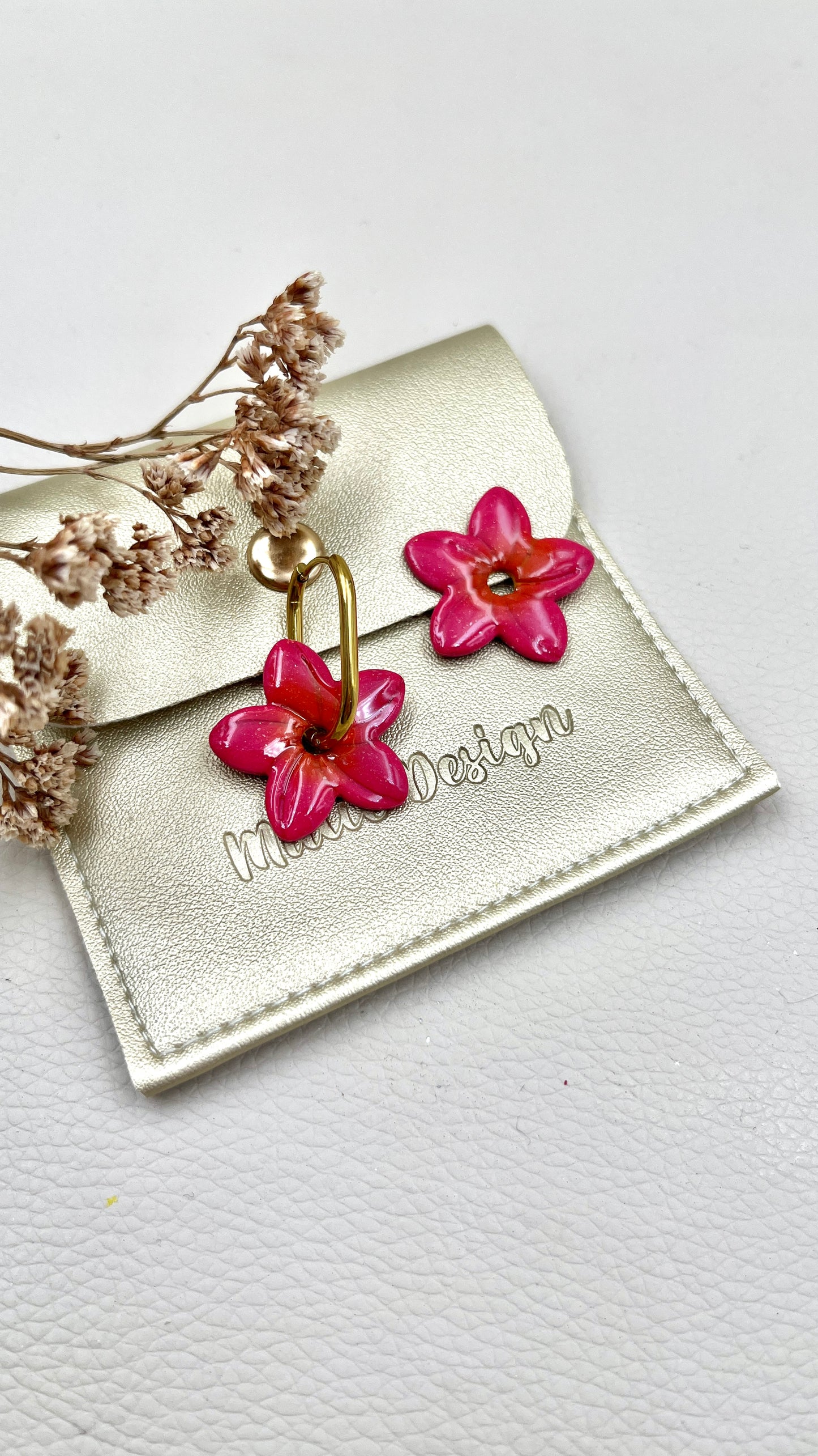 Pampilles Monoï fushia